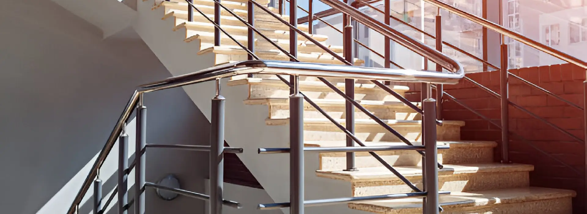 SS Architectural Staircase Railing (SS304 Brushed Finish) — Curved staircase handrail assembly — Sun Railings commercial project delivery